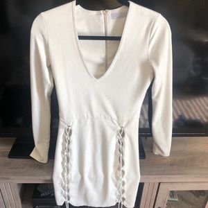 White dress with tie up side details